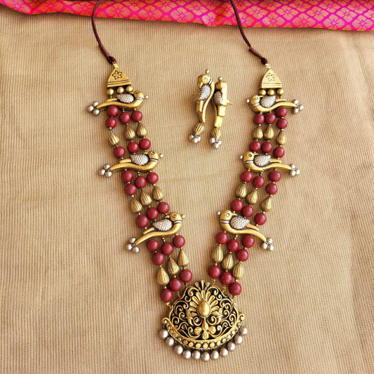 Morva terracotta parrot necklace dual-tone gold silver maroon