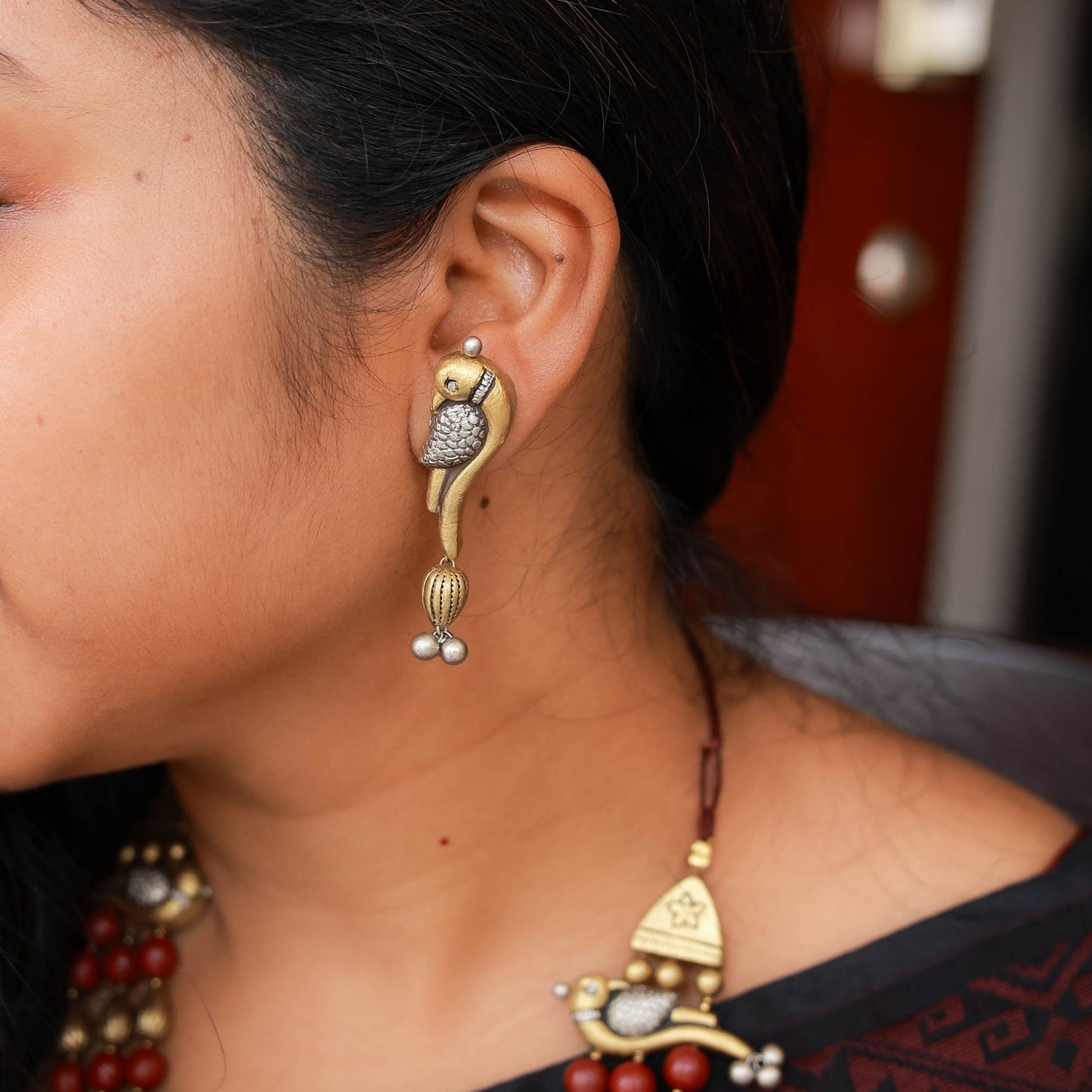 Dual-tone gold & silver parrot motif