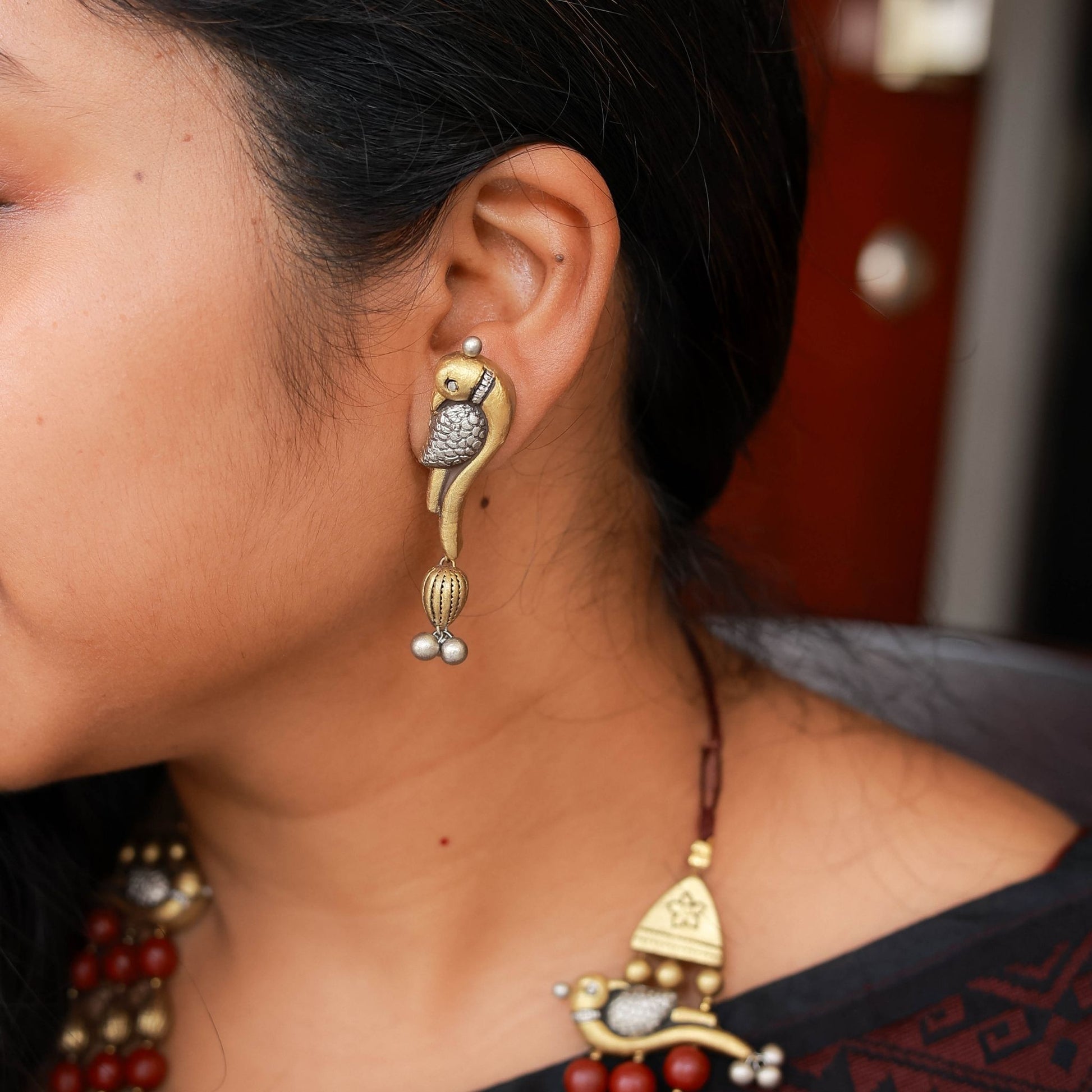 Dual-tone gold & silver parrot motif