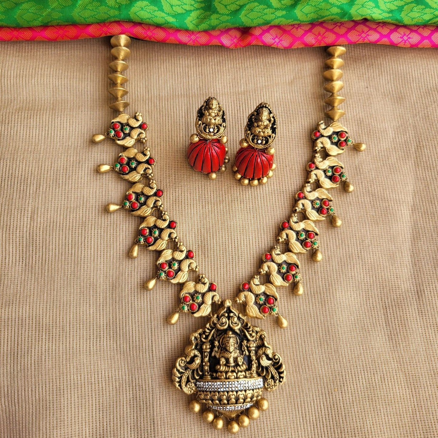 Antique gold Lakshmi pendant handcrafted terracotta
