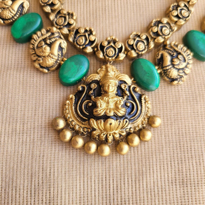 Peacock motifs & green oval beads