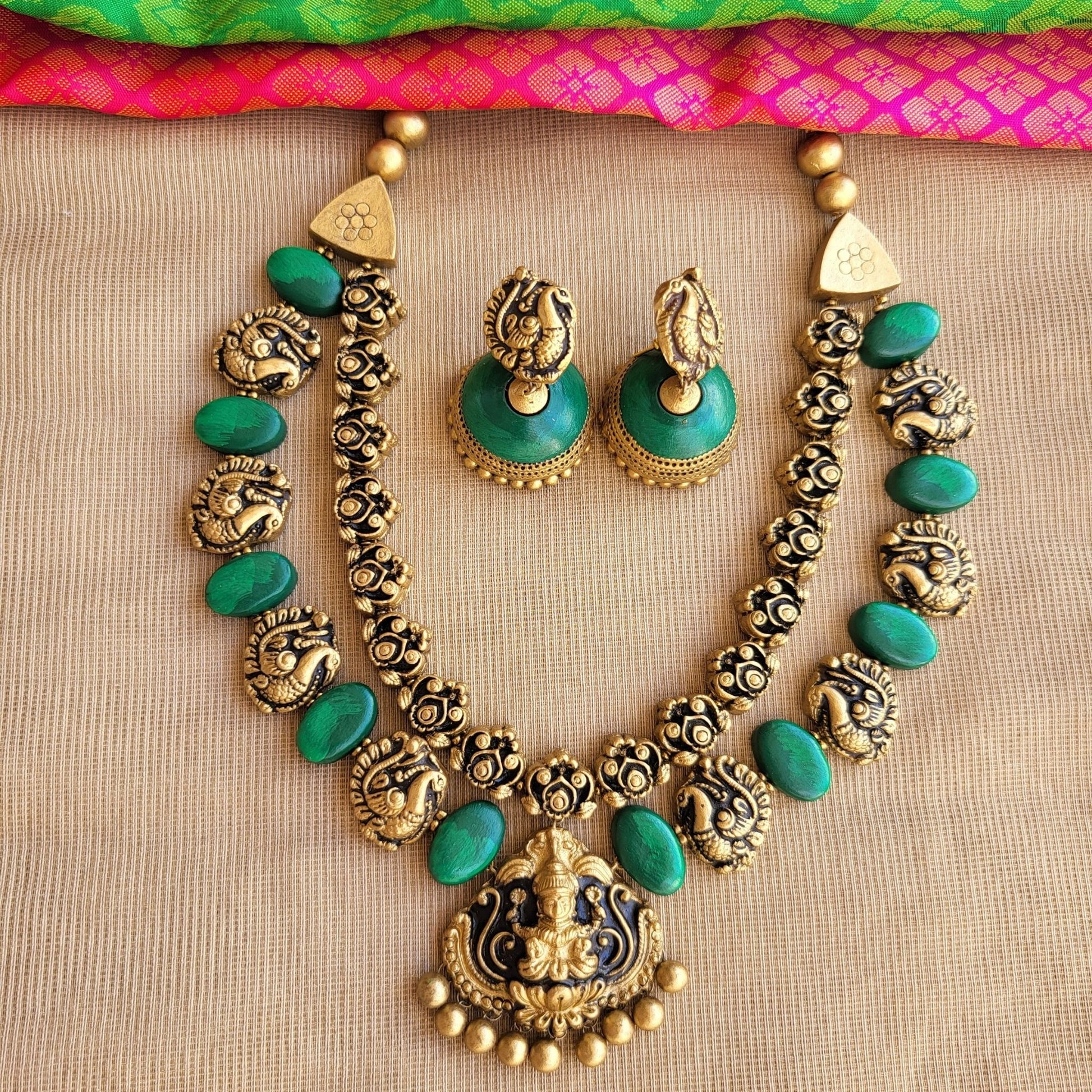 Antique gold Lakshmi pendant