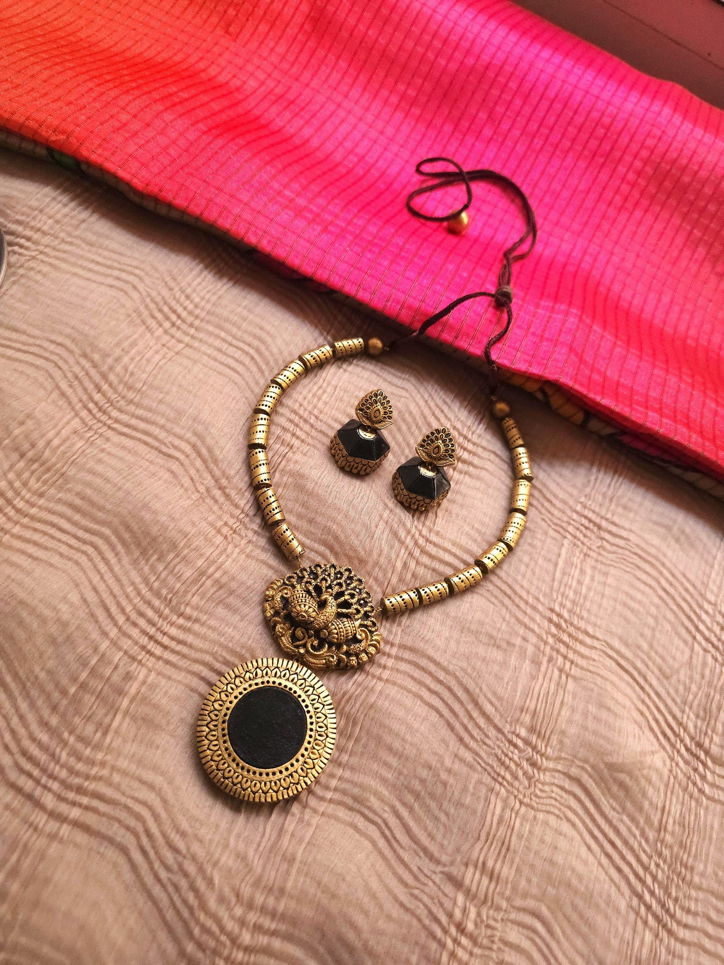 Nirupama Antique Gold Peacock & Black Medallion Terracotta Set