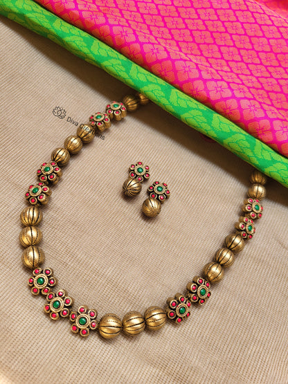 Simple flower and bead terracotta jewellery