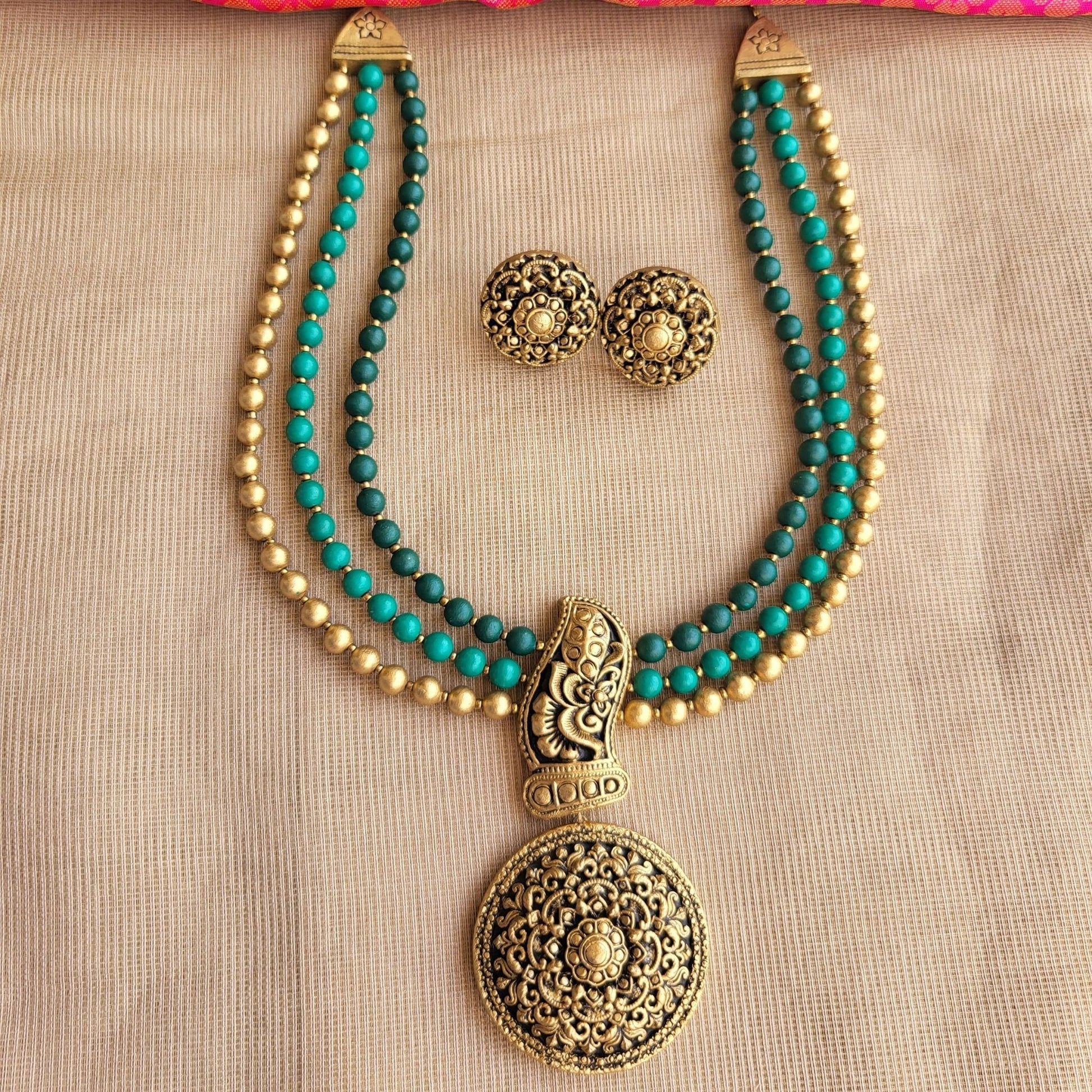 Handcrafted three-row terracotta necklace