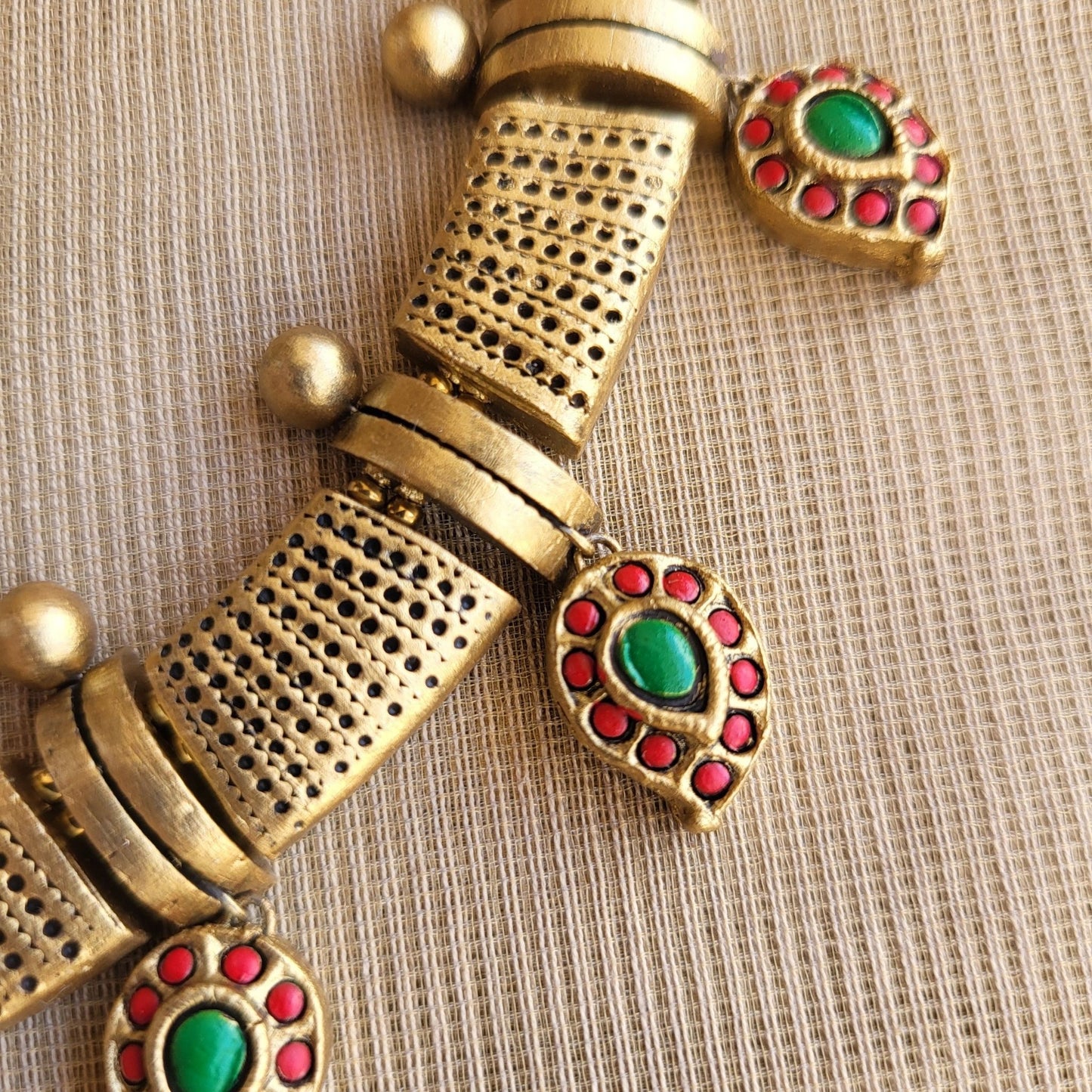 Handmade terracotta necklace with red and green mango pendants