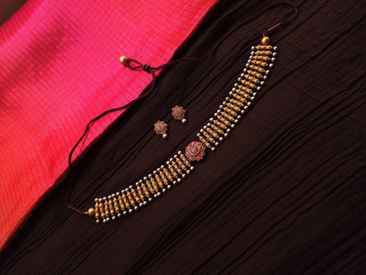 Rukmini Antique Gold Ribbed Spindle & Crimson Rosette Terracotta Choker Set