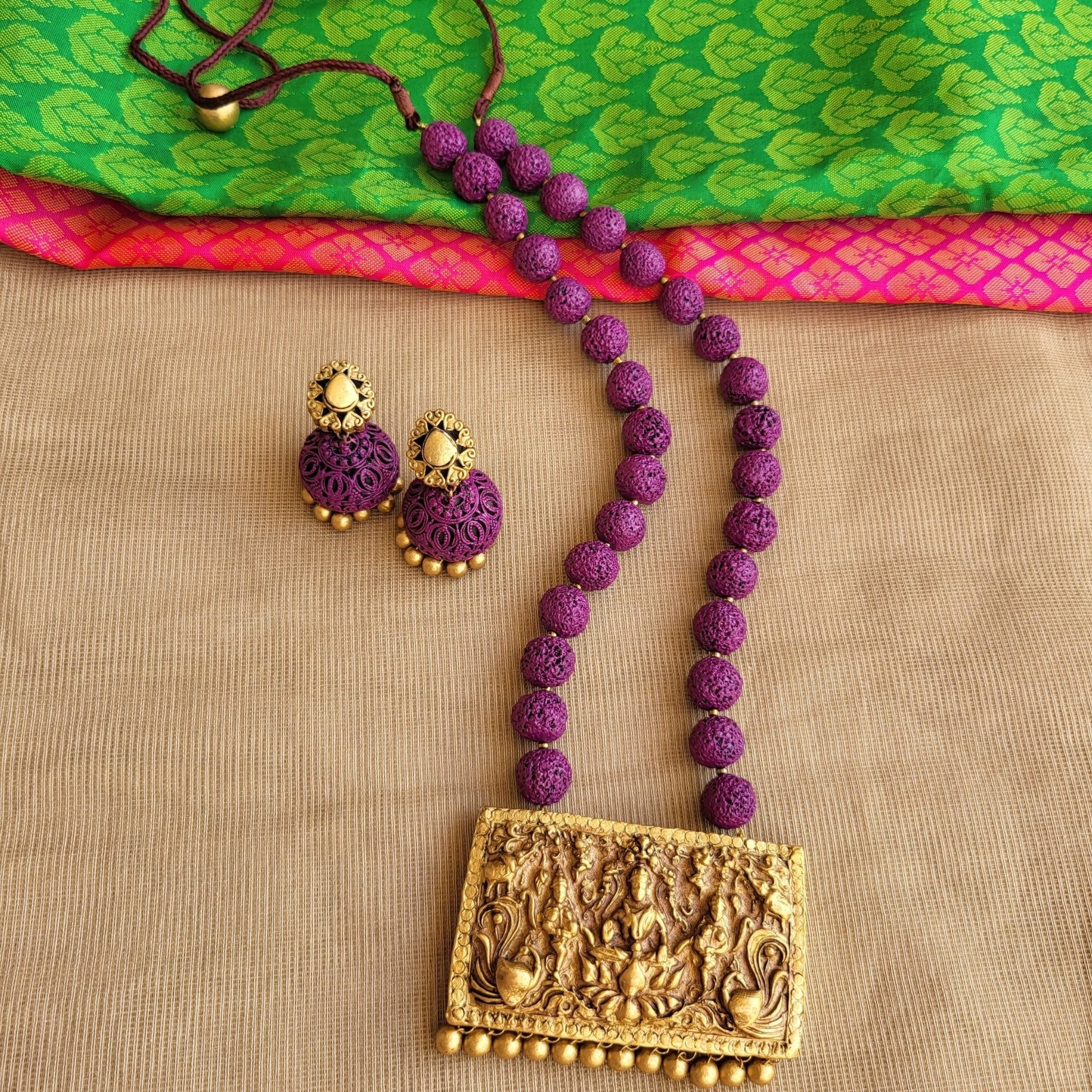 Handmade spiritual jewelry with purple Rudraksh beads