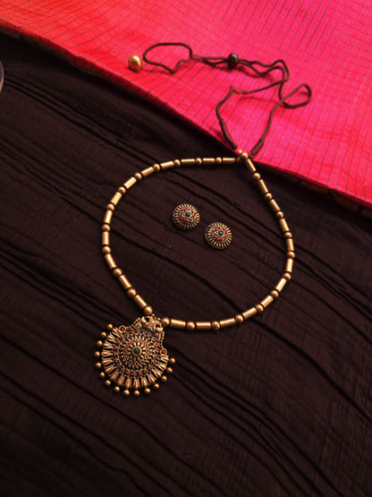 Tanvi Antique Gold Tubular Bead & Concentric Chakra Terracotta Pendant Set