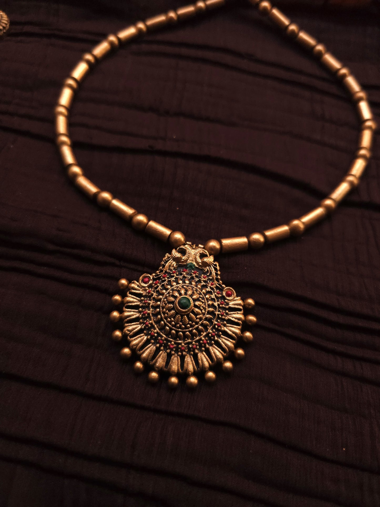 Tanvi Antique Gold Tubular Bead & Concentric Chakra Terracotta Pendant Set