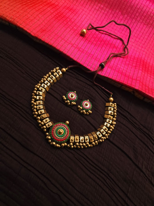 The Chakra Avartan Geometric Antique Gold & Tri-Color Terracotta Set