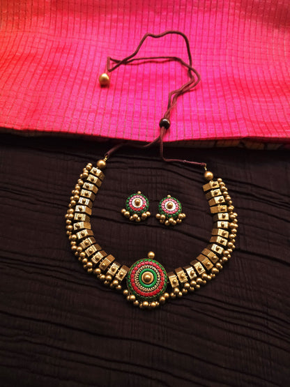 The Chakra Avartan Geometric Antique Gold & Tri-Color Terracotta Set