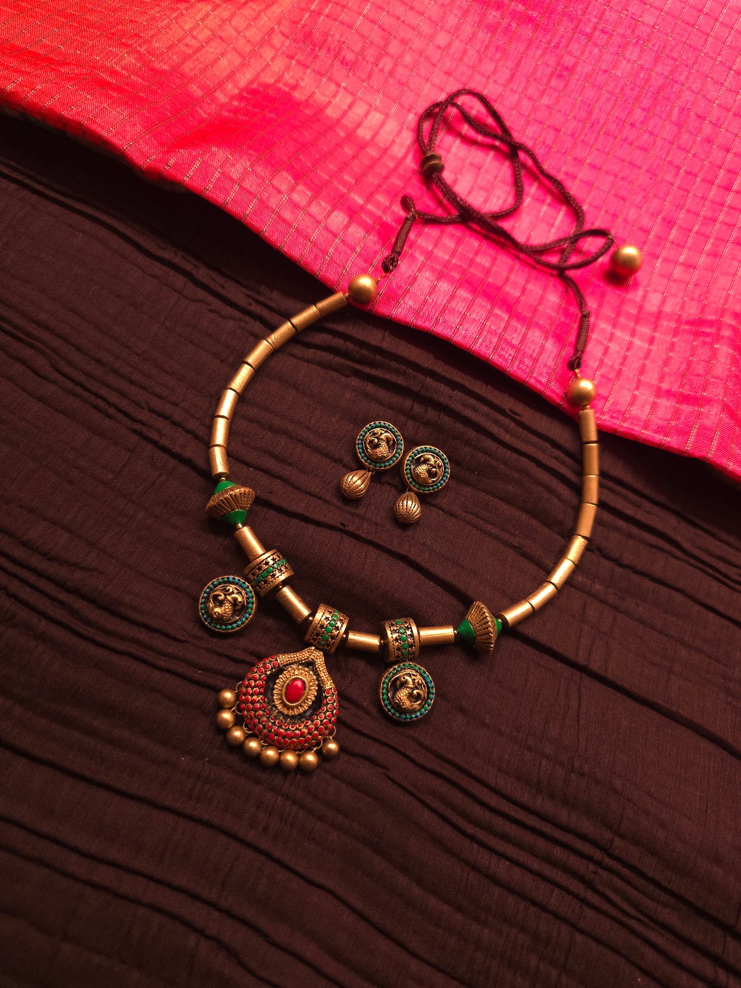 The Crimson Mayura Antique Gold & Ruby Peacock Terracotta Set