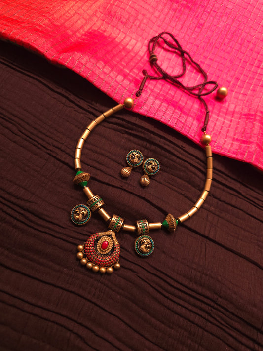 The Crimson Mayura Antique Gold & Ruby Peacock Terracotta Set