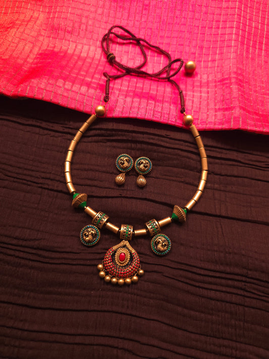 The Crimson Mayura Antique Gold & Ruby Peacock Terracotta Set