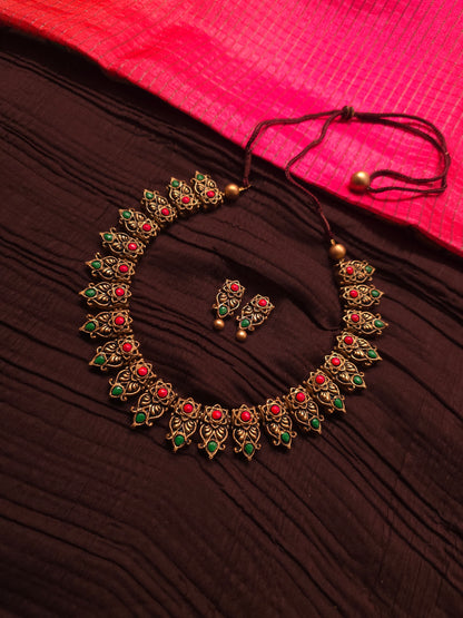 The Kirti Mukha Antique Gold & Tri-Color Floral Crest Terracotta Set