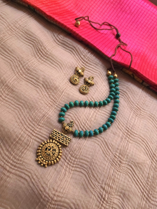 The Mayura Chandrika Antique Gold Peacock & Turquoise Bead Terracotta Set