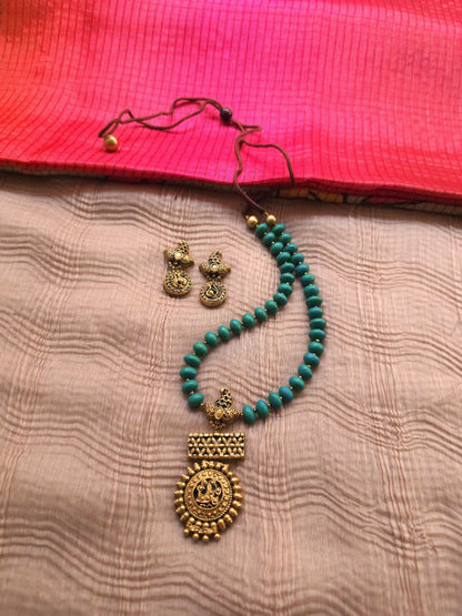 The Mayura Chandrika Antique Gold Peacock & Turquoise Bead Terracotta Set