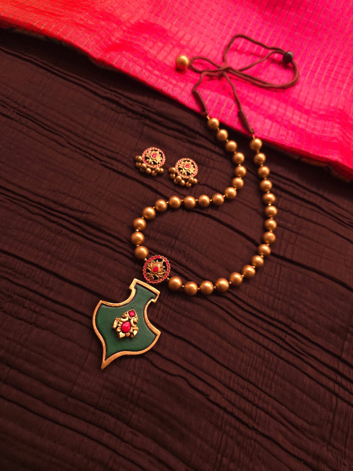 The Shield of Ganesha Antique Gold & Forest Green Terracotta Set