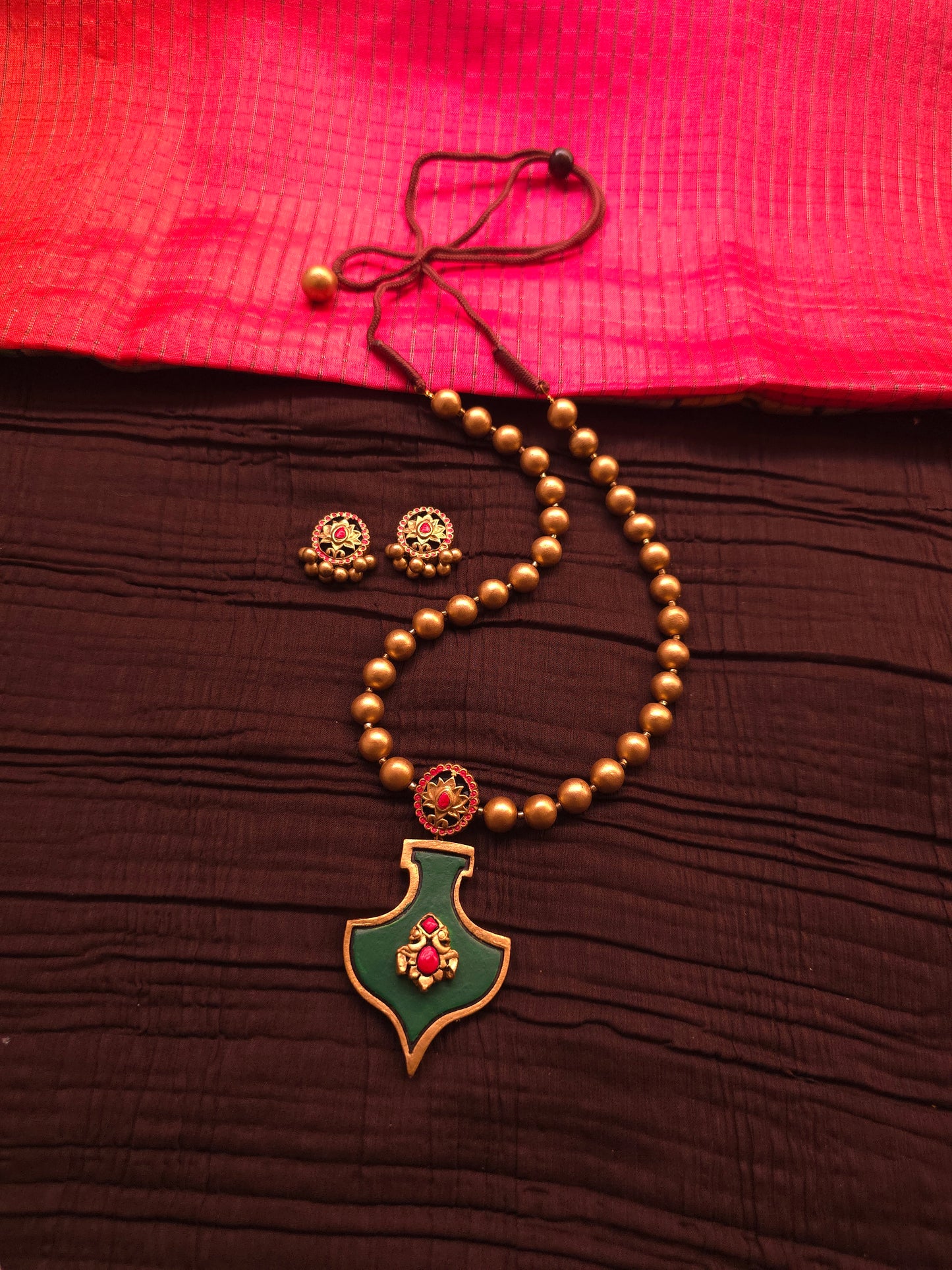 The Shield of Ganesha Antique Gold & Forest Green Terracotta Set