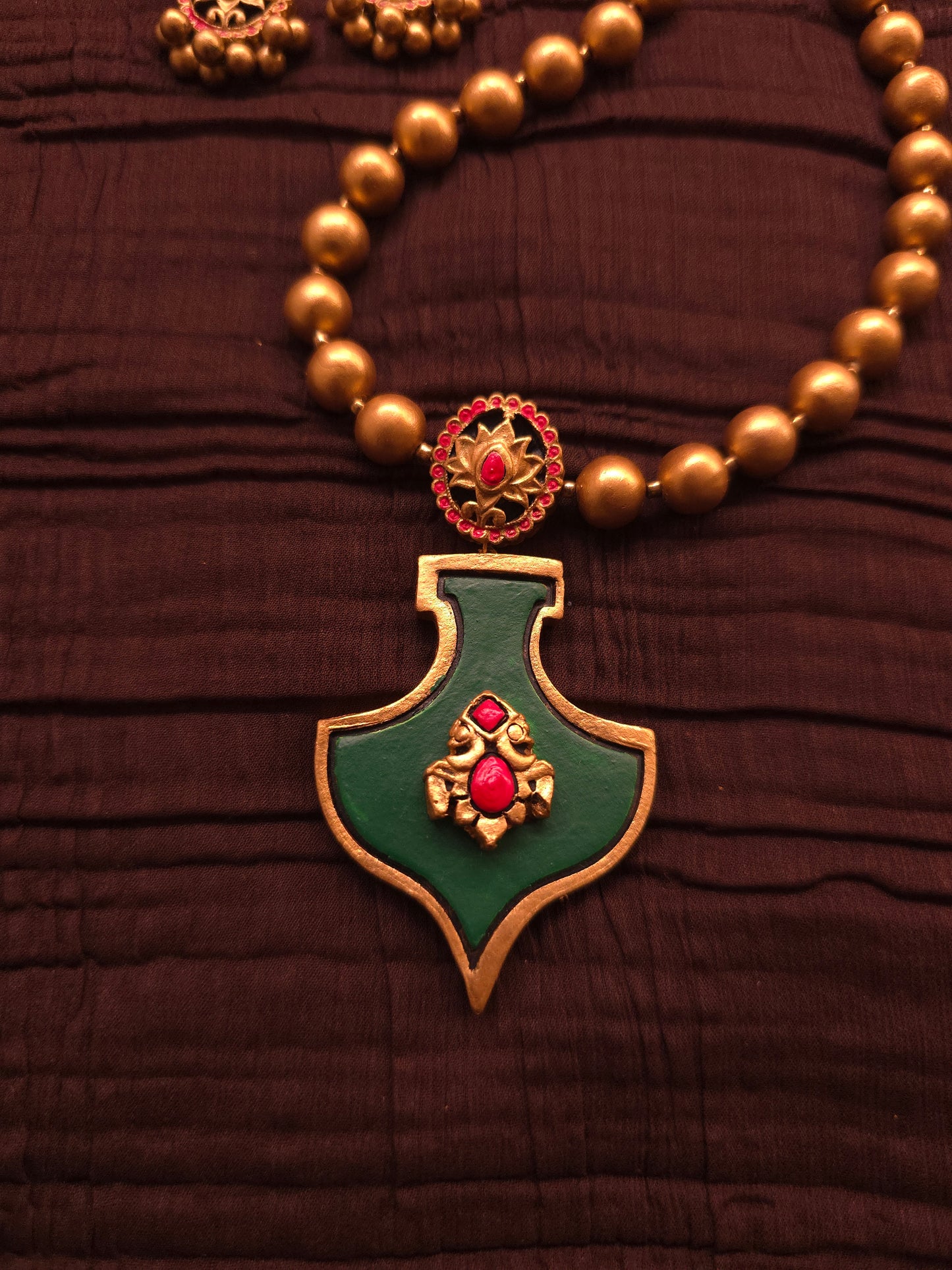 The Shield of Ganesha Antique Gold & Forest Green Terracotta Set
