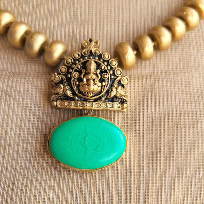 Handmade Lakshmi green oval necklace