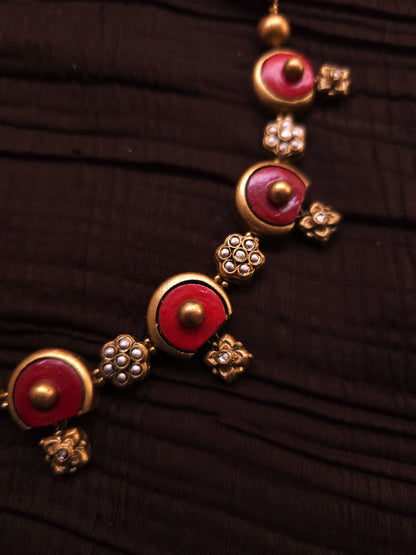 Trishala Antique Gold Crescent & Crimson Red Terracotta Choker Set