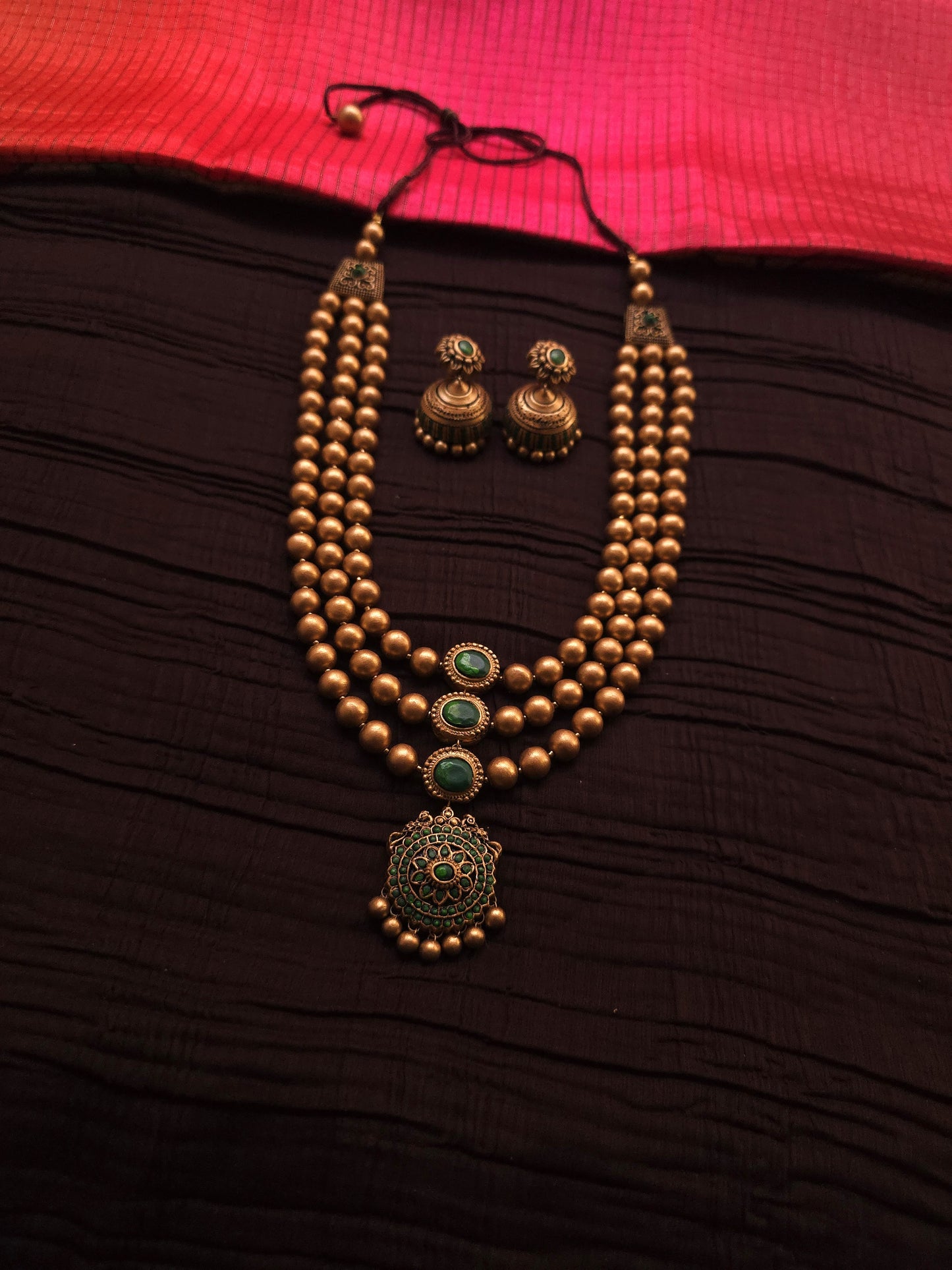 Vaishnavi Antique Gold Three-Layer Bead & Emerald Green Terracotta Set
