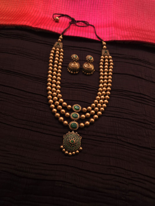 Vaishnavi Antique Gold Three-Layer Bead & Emerald Green Terracotta Set