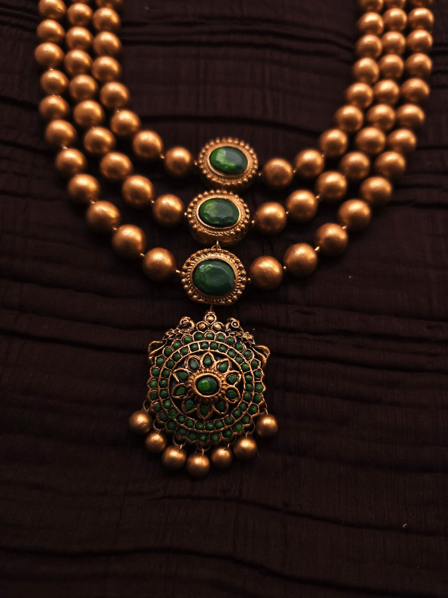 Vaishnavi Antique Gold Three-Layer Bead & Emerald Green Terracotta Set
