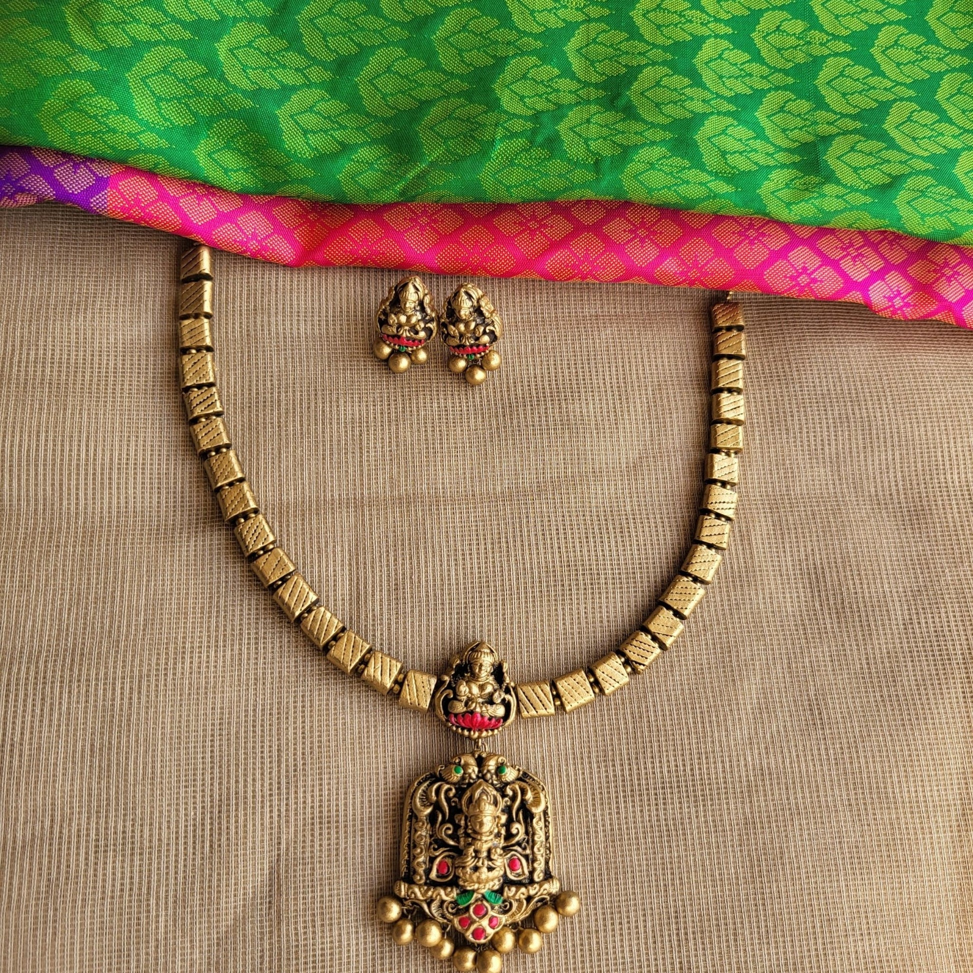 Antique gold with pink & green accents