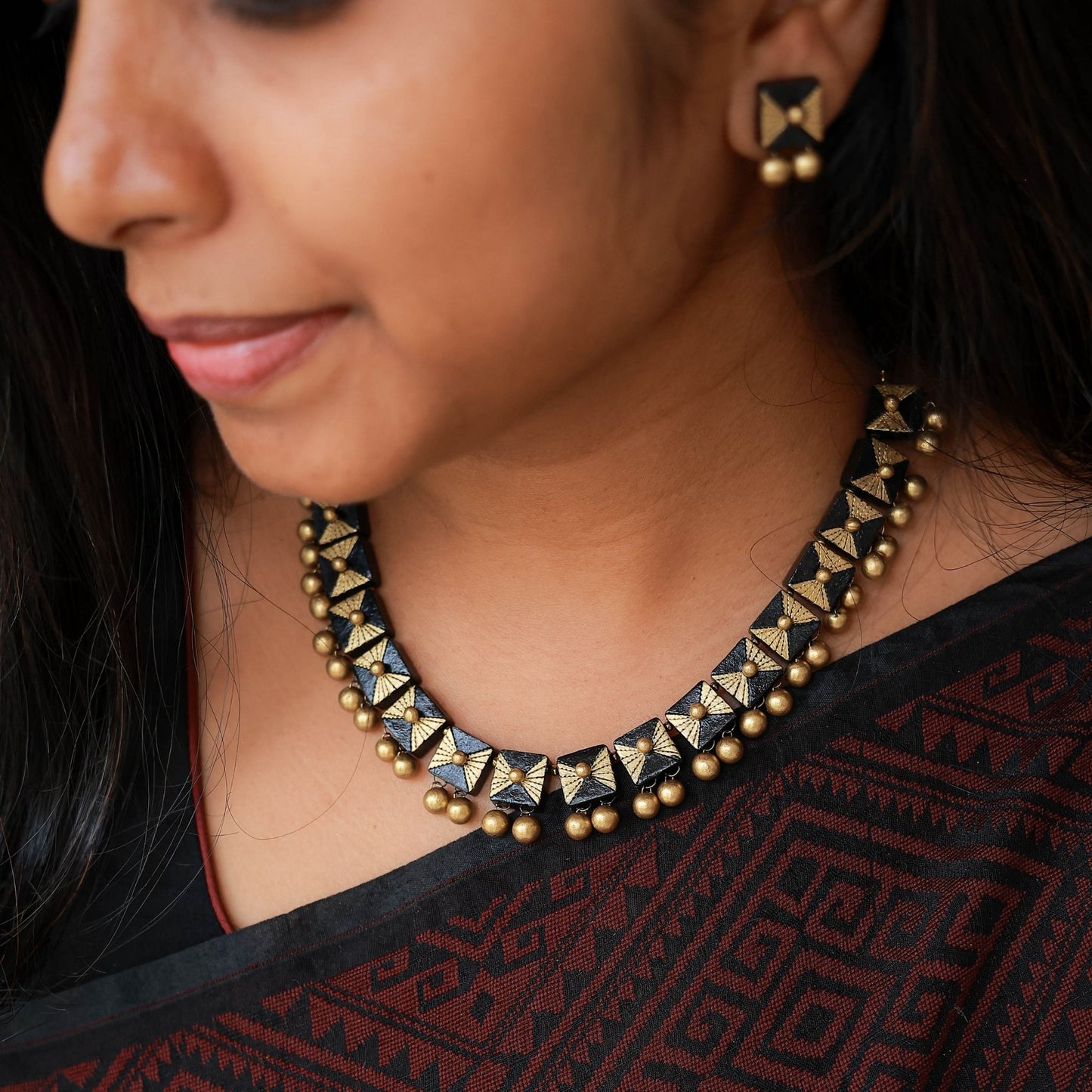 Vizhii handmade terracotta necklace and earrings