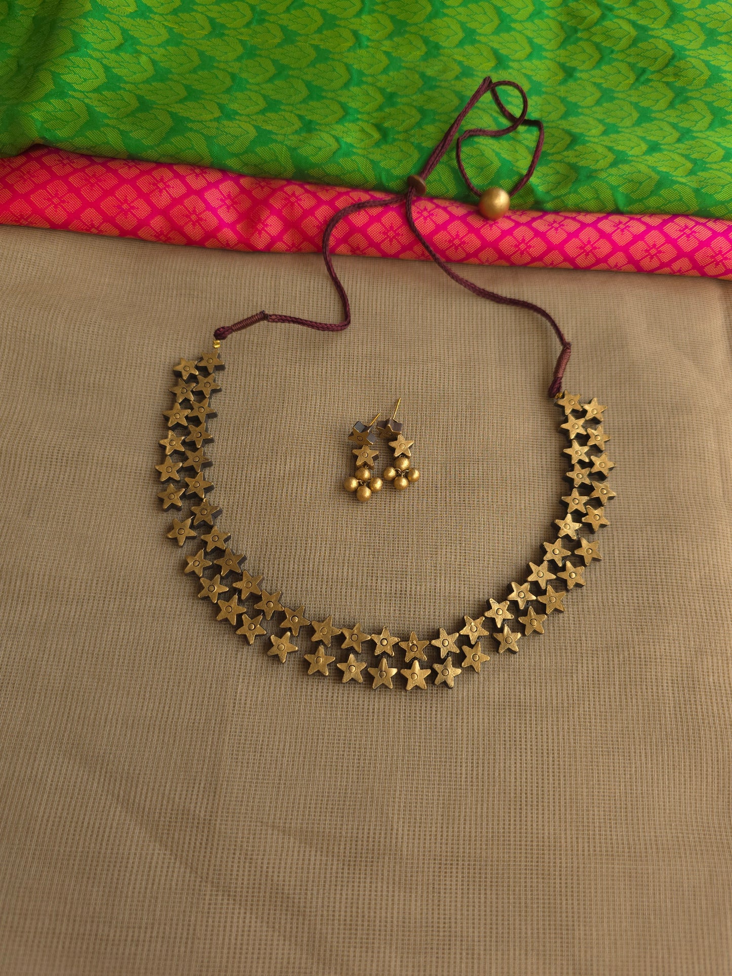 Handcrafted terracotta jewellery radiant gold design