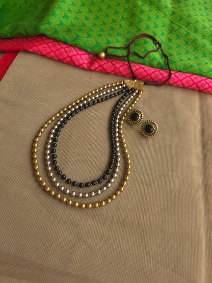 Hand painted terracotta necklace with layered beads