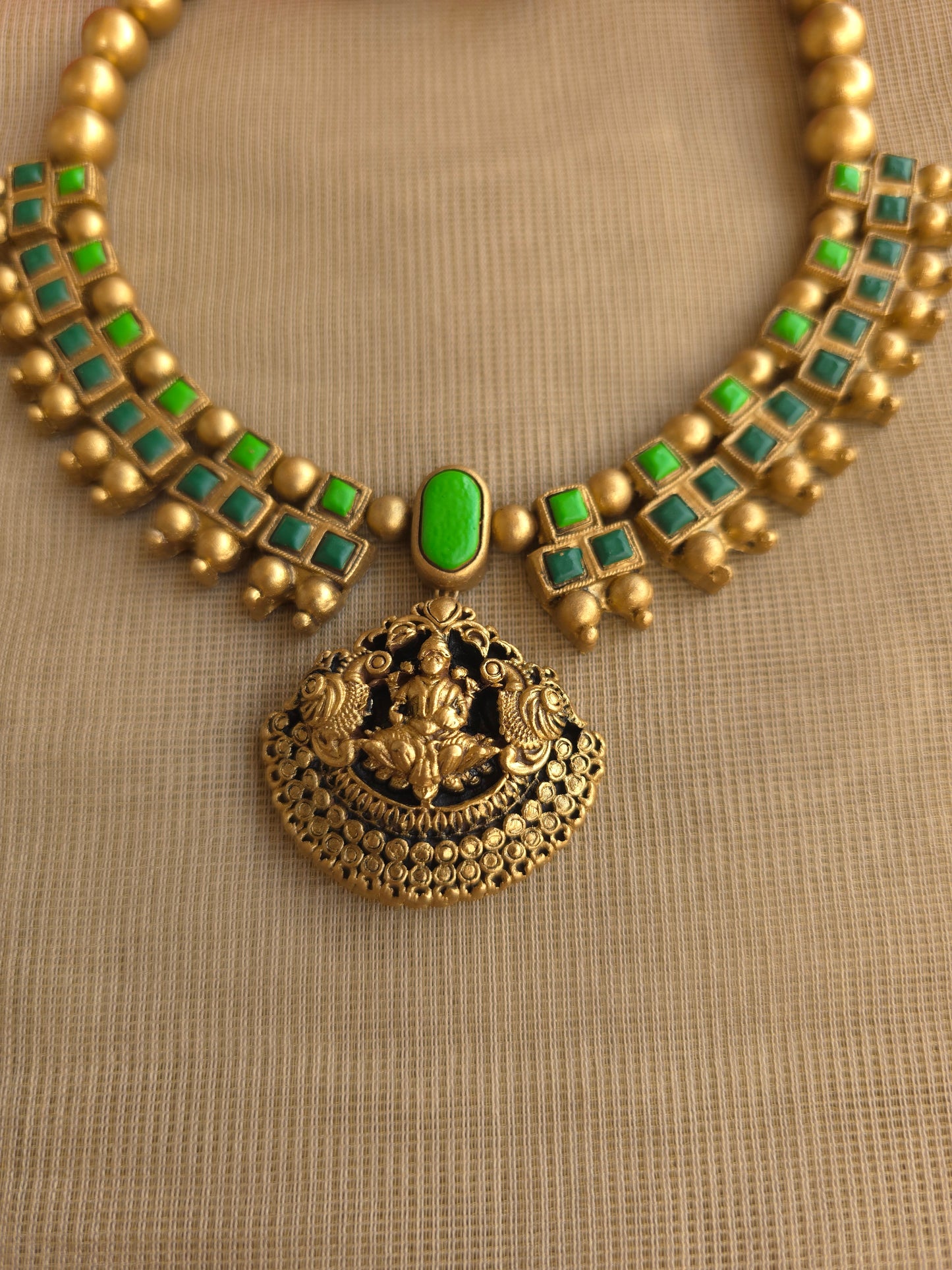 Handmade terracotta lakshmi pendant green square design