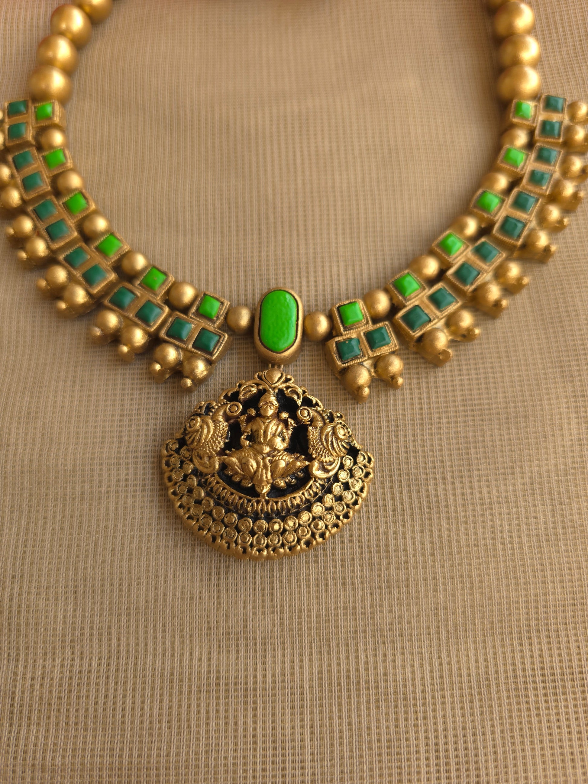 Handmade terracotta lakshmi pendant green square design