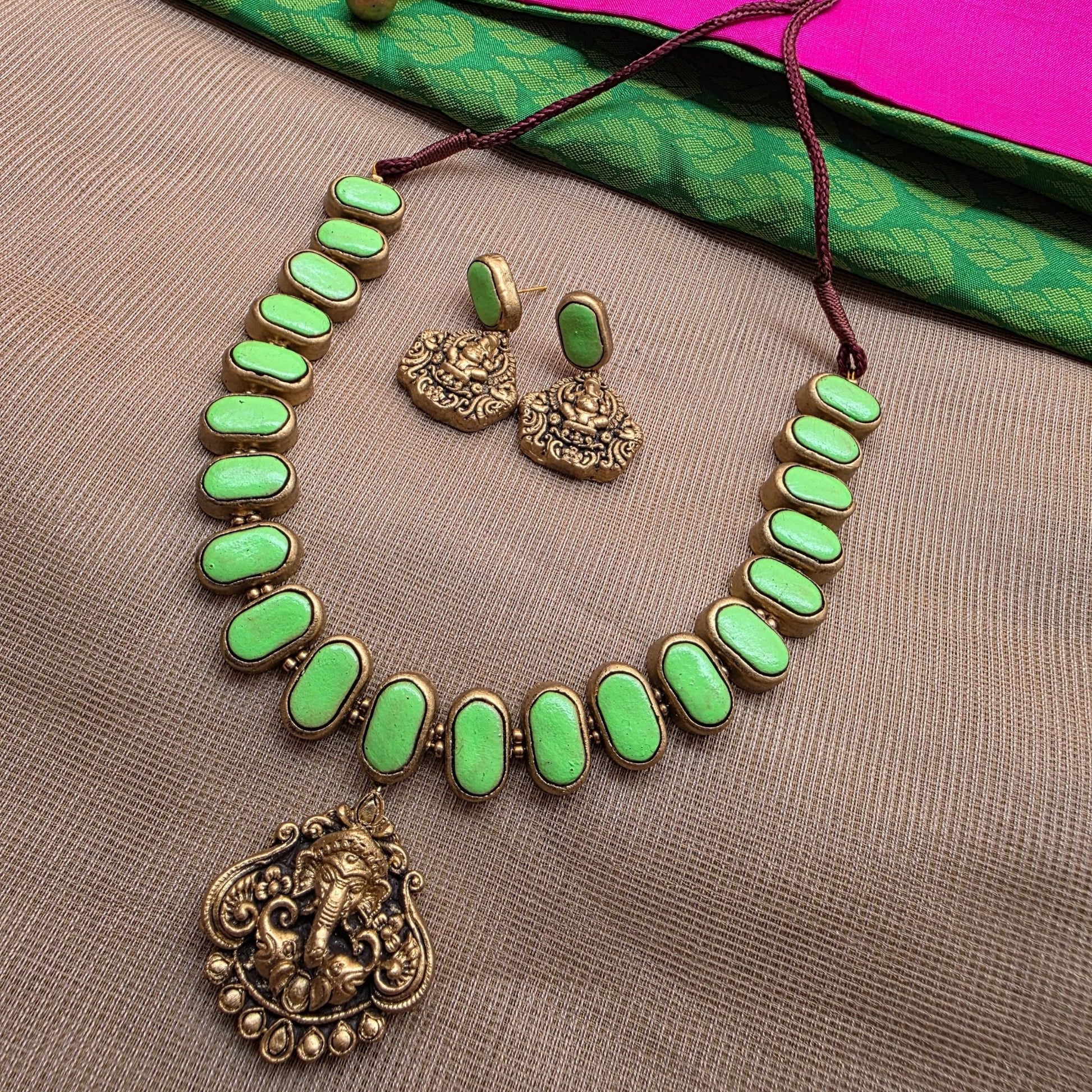 Kemp New Terracotta Jewellery Light Green Jhumka Earrings