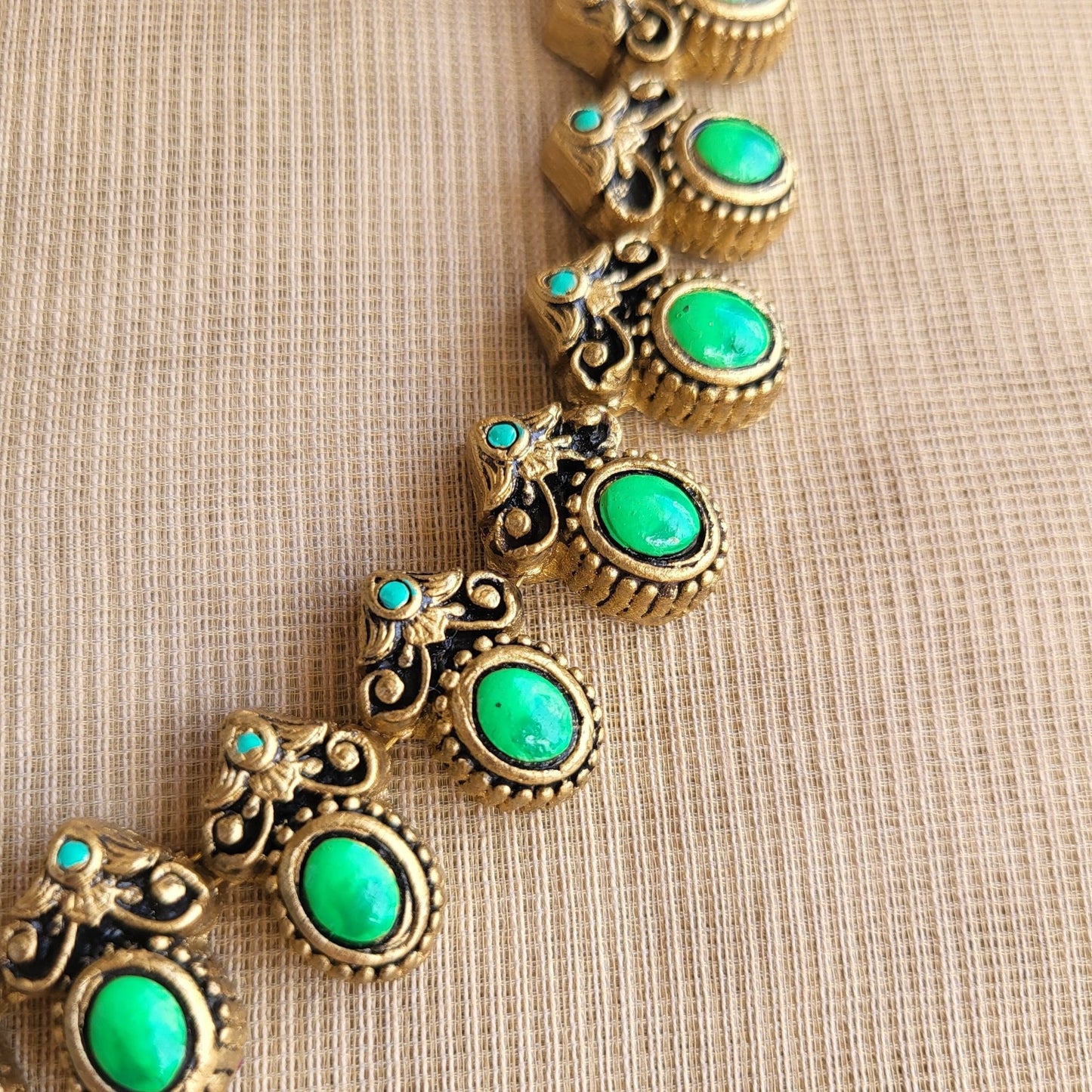 Traditional Indian terracotta jewellery set with green and gold tones