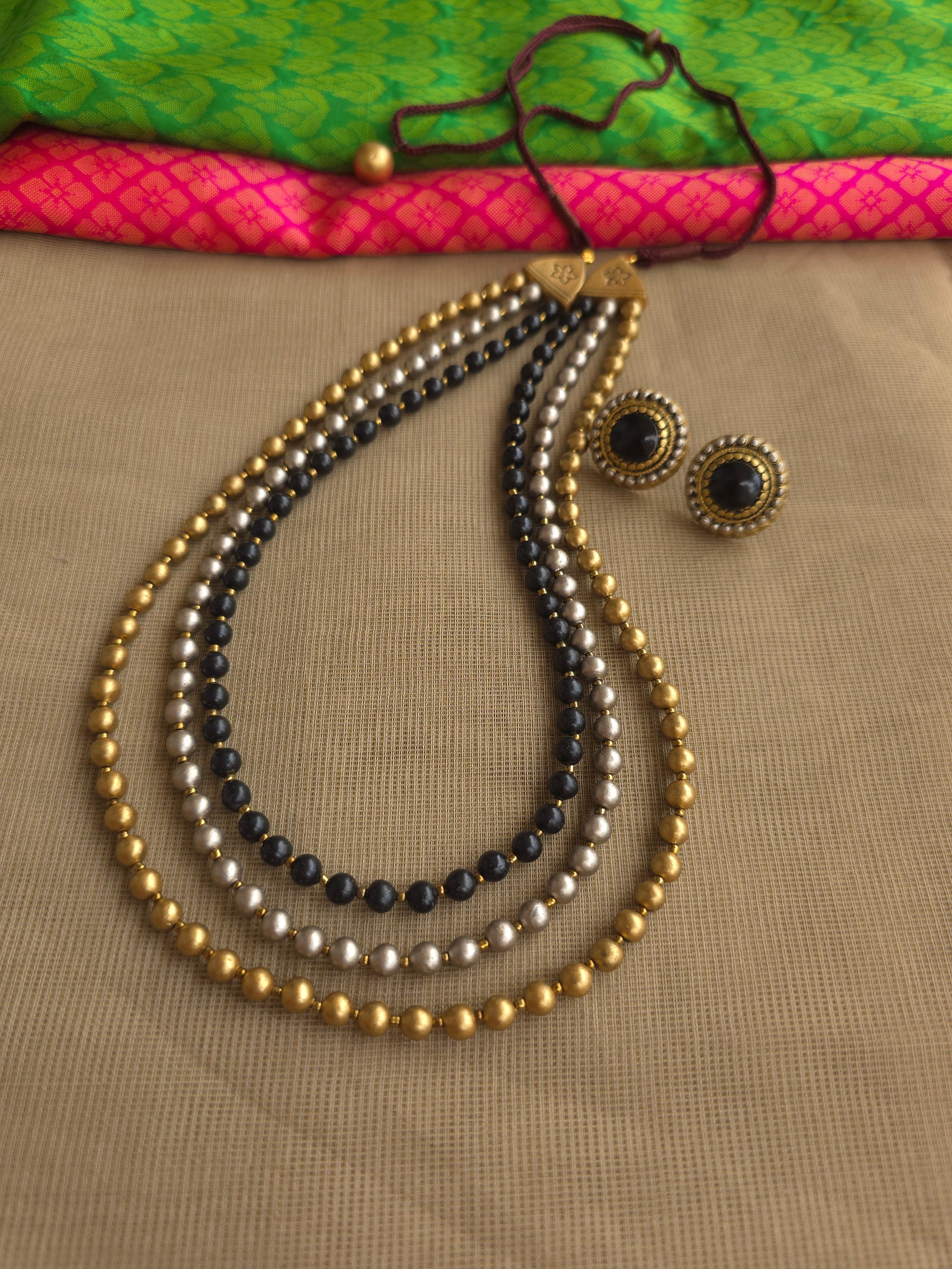 Artisan crafted triple layer terracotta jewellery necklace