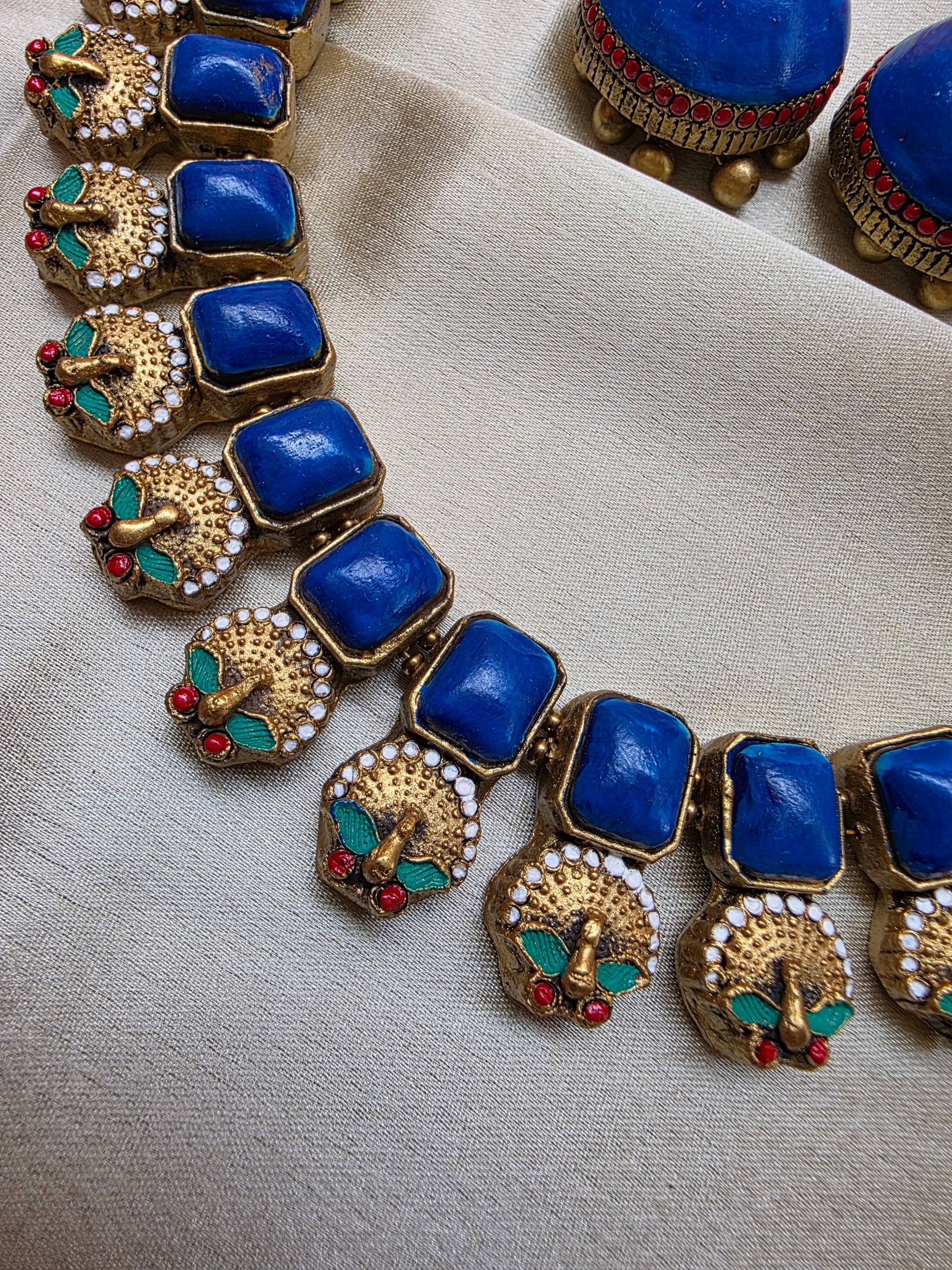 Terracotta Blue Hue Peacock Necklace with Jhumka