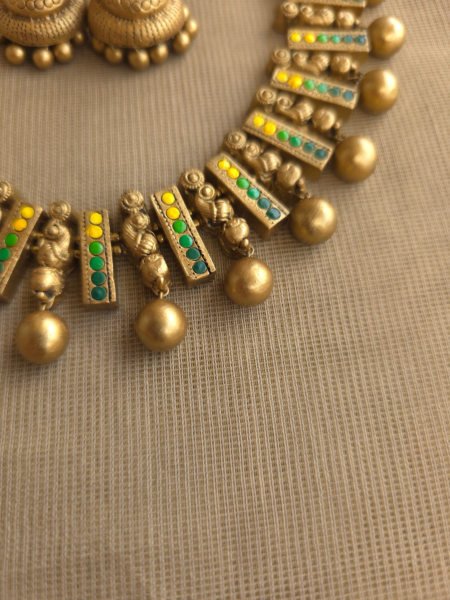 Yellow green terracotta necklace peacock motif design